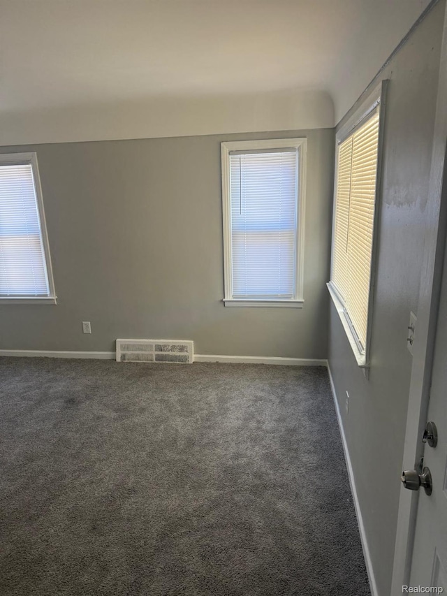 18950 Blackmoor St, Detroit, MI 48234 - unfurnished room with carpet floors and baseboards