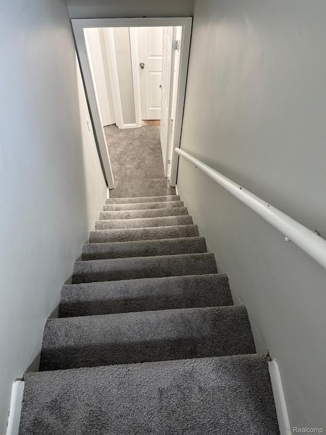 18950 Blackmoor St, Detroit, MI 48234 - stairway featuring carpet