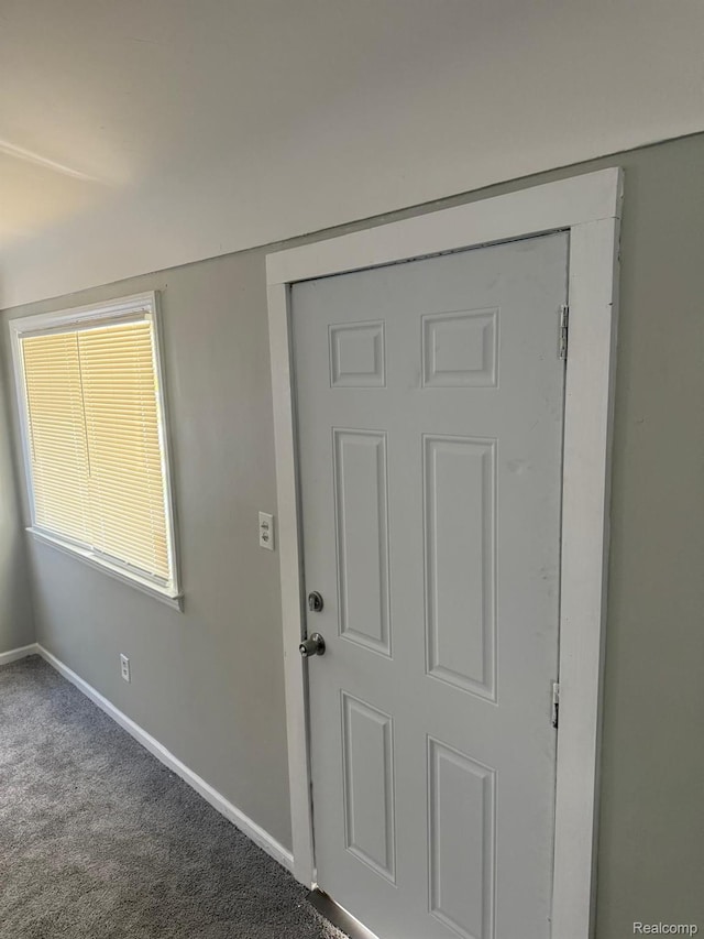 18950 Blackmoor St, Detroit, MI 48234 - carpeted foyer entrance featuring baseboards