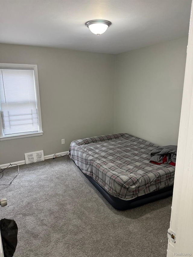 18950 Blackmoor St, Detroit, MI 48234 - carpeted bedroom with baseboards