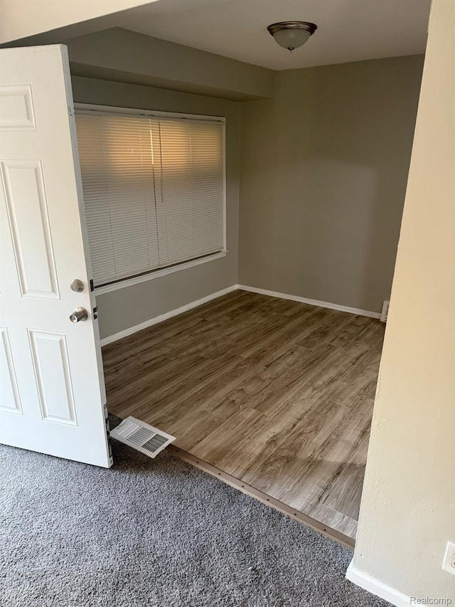 18950 Blackmoor St, Detroit, MI 48234 - spare room with baseboards and wood finished floors