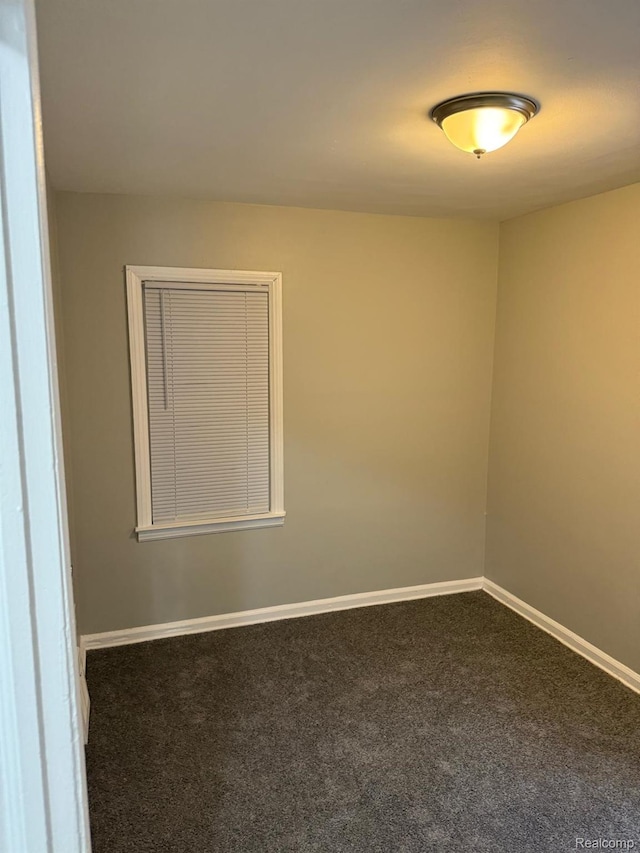 18950 Blackmoor St, Detroit, MI 48234 - empty room with carpet flooring and baseboards