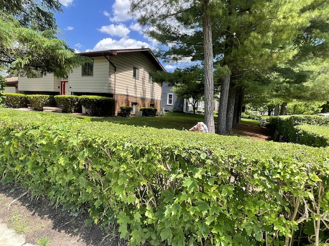 2323 Page Ave, Ann Arbor, MI 48104 - view of side of property with brick siding