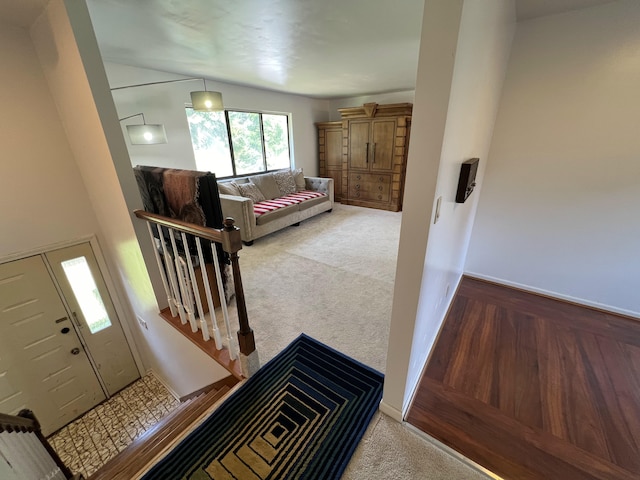 2323 Page Ave, Ann Arbor, MI 48104 - stairs featuring carpet floors and baseboards