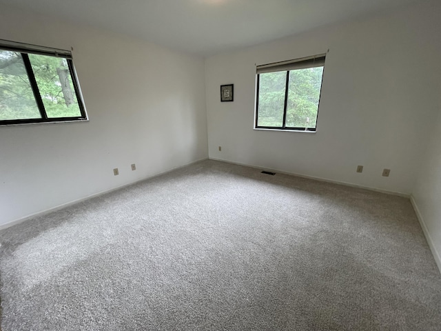 2323 Page Ave, Ann Arbor, MI 48104 - carpeted empty room featuring baseboards