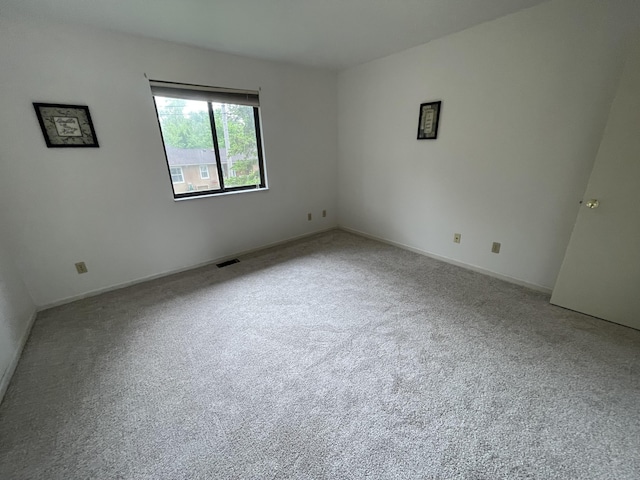 2323 Page Ave, Ann Arbor, MI 48104 - carpeted empty room with baseboards