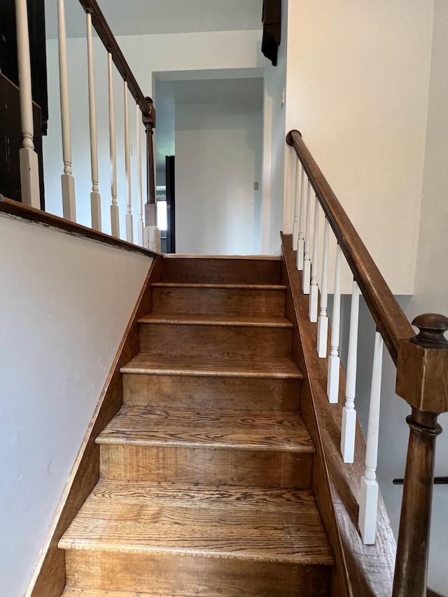 2323 Page Ave, Ann Arbor, MI 48104 - staircase featuring baseboards
