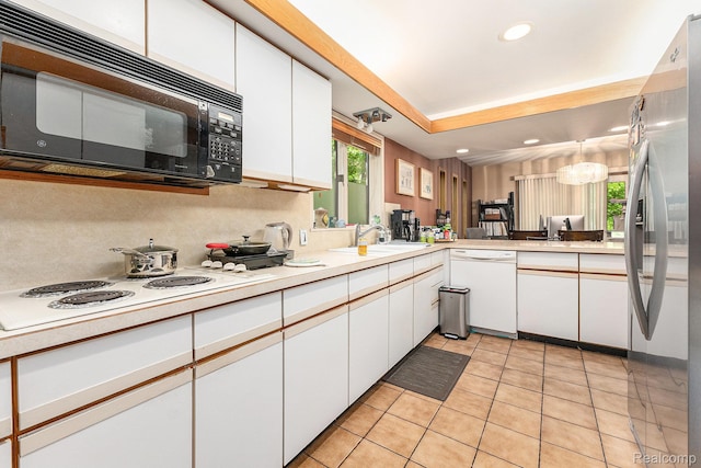5130 Whitlow Ct, Commerce Twp, MI 48382 - kitchen featuring white appliances, a sink, light countertops, white cabinetry, and recessed lighting