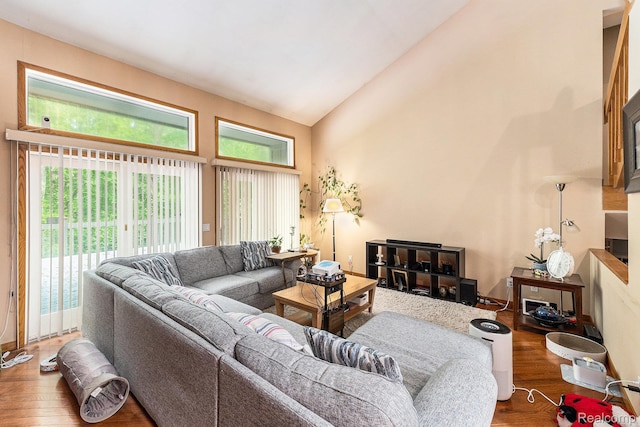 5130 Whitlow Ct, Commerce Twp, MI 48382 - living area with wood finished floors and high vaulted ceiling