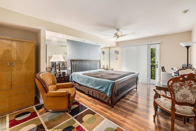 5130 Whitlow Ct, Commerce Twp, MI 48382 - bedroom featuring access to outside, wood finished floors, and ceiling fan