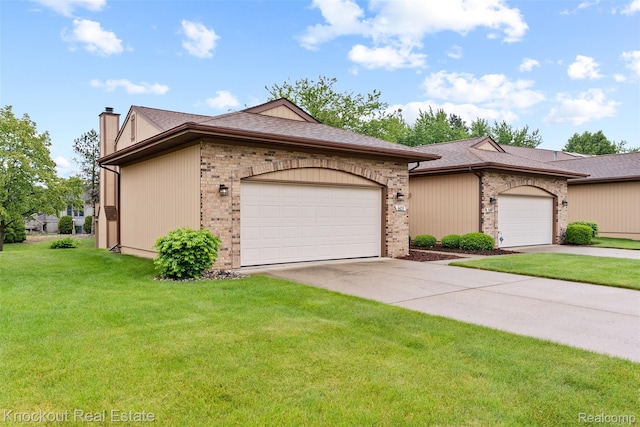 601 Churchgrove Rd, Frankenmuth, MI 48734 - view of front of house featuring a chimney, a front lawn, brick siding, and a shingled roof