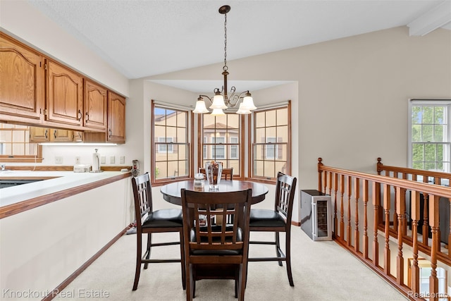 601 Churchgrove Rd, Frankenmuth, MI 48734 - dining area with a chandelier and light carpet