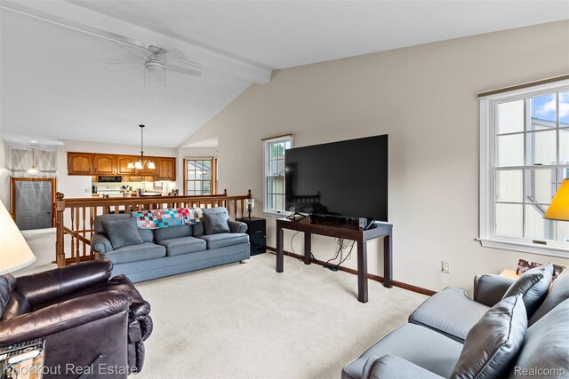 601 Churchgrove Rd, Frankenmuth, MI 48734 - living area featuring a chandelier, light carpet, ceiling fan, and healthy amount of natural light