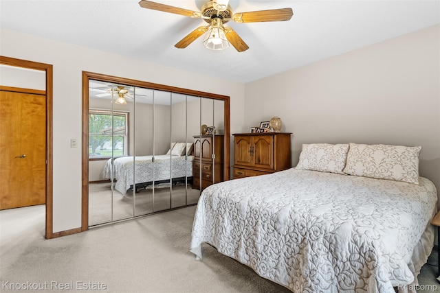 601 Churchgrove Rd, Frankenmuth, MI 48734 - bedroom with light carpet, a closet, ceiling fan, and baseboards