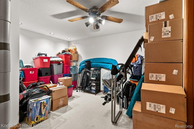 601 Churchgrove Rd, Frankenmuth, MI 48734 - workout room with a ceiling fan, carpet floors, a textured ceiling, and recessed lighting