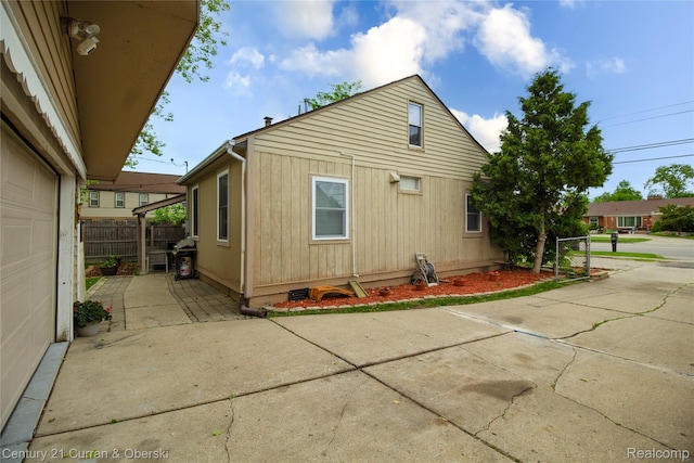 7641 N Inkster Rd, Westland, MI 48185 - view of side of property featuring a patio area