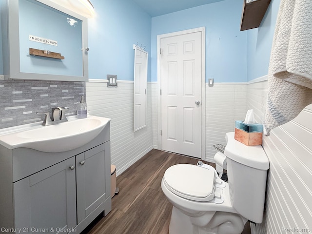 7641 N Inkster Rd, Westland, MI 48185 - half bath with wainscoting, toilet, vanity, and wood finished floors
