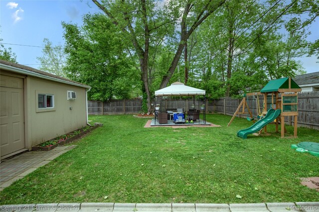 7641 N Inkster Rd, Westland, MI 48185 - view of yard featuring a playground, an outdoor hangout area, a gazebo, and a patio area