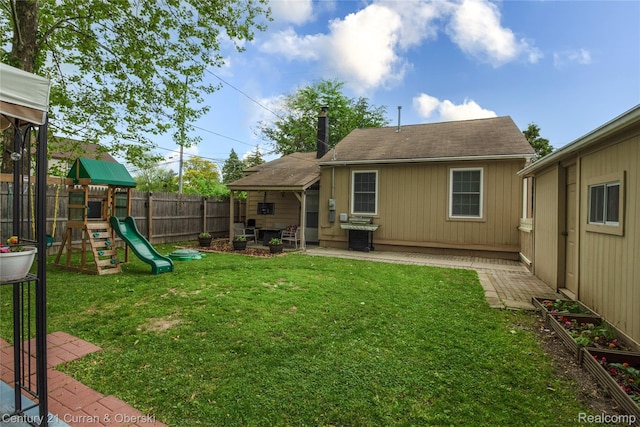 7641 N Inkster Rd, Westland, MI 48185 - view of yard with a patio and a playground