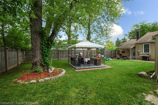 7641 N Inkster Rd, Westland, MI 48185 - view of yard with a playground and a gazebo