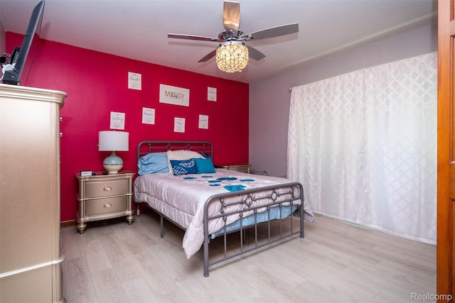 38649 Deerwood Ct, Northville, MI 48167 - bedroom with wood finished floors and ceiling fan