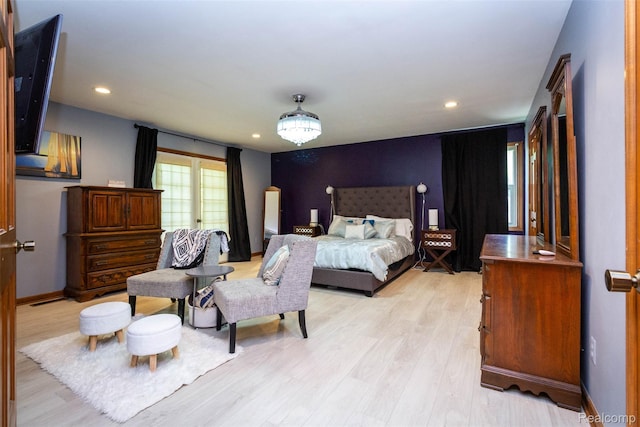 38649 Deerwood Ct, Northville, MI 48167 - bedroom featuring light wood-style floors, recessed lighting, and baseboards