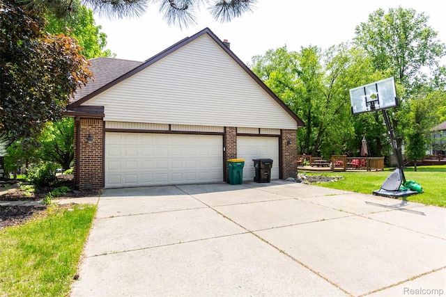 38649 Deerwood Ct, Northville, MI 48167 - garage featuring driveway