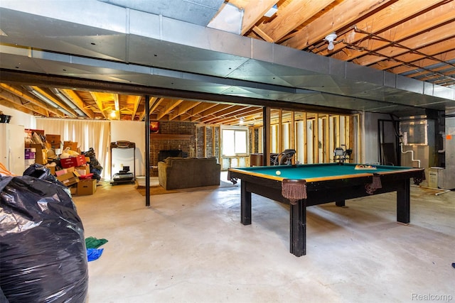 38649 Deerwood Ct, Northville, MI 48167 - below grade area with pool table and a fireplace
