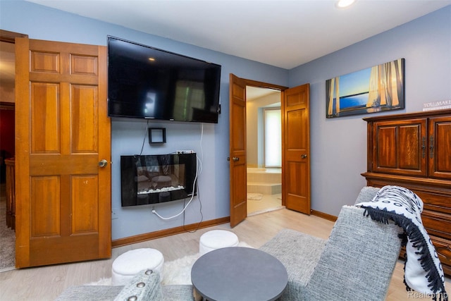 38649 Deerwood Ct, Northville, MI 48167 - living room with light wood-style floors and baseboards