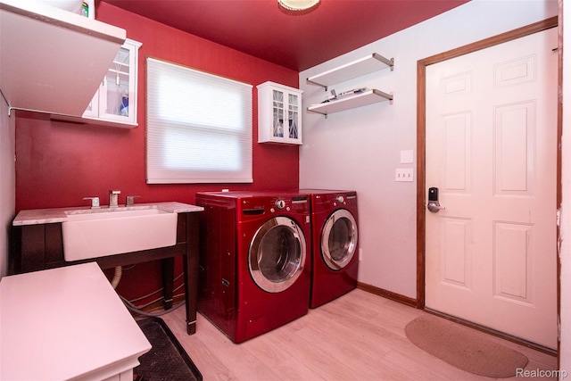 38649 Deerwood Ct, Northville, MI 48167 - washroom featuring washer and dryer, wood finished floors, and baseboards