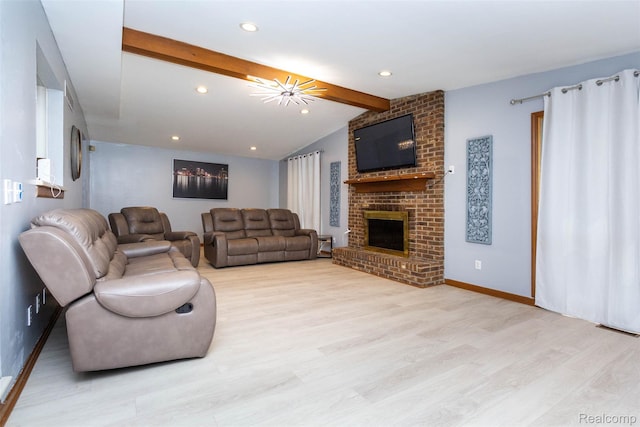 38649 Deerwood Ct, Northville, MI 48167 - living area with wood finished floors, a brick fireplace, baseboards, and recessed lighting