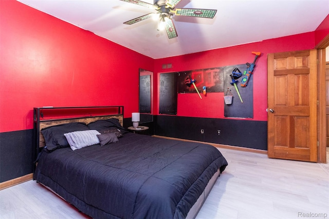 38649 Deerwood Ct, Northville, MI 48167 - bedroom featuring wood finished floors, a ceiling fan, and baseboards