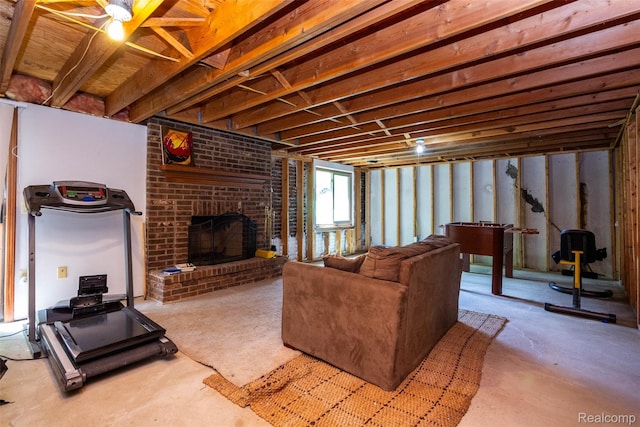 38649 Deerwood Ct, Northville, MI 48167 - living room featuring a brick fireplace and concrete floors