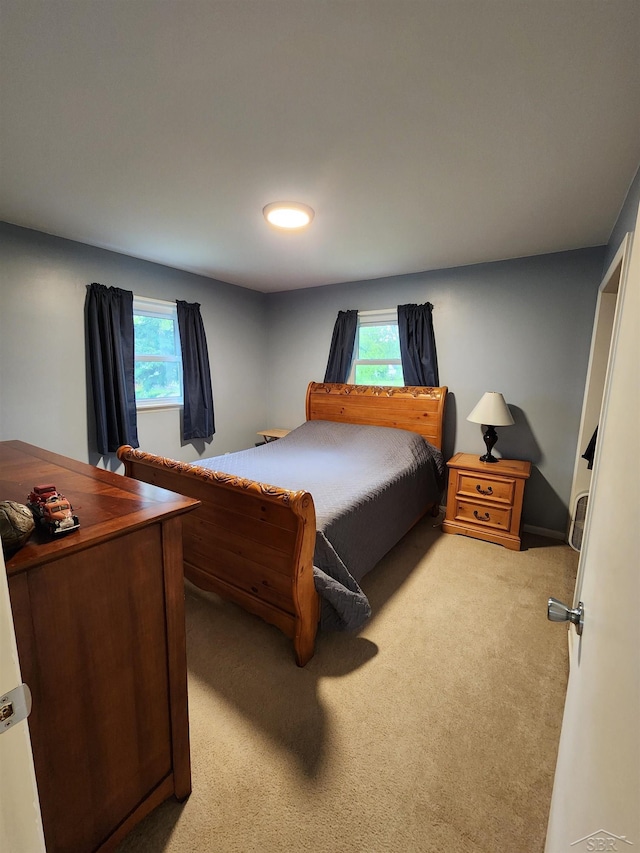 2285 Nebraska Ave, Saginaw, MI 48601 - bedroom featuring light carpet
