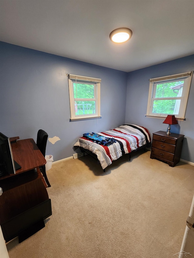 2285 Nebraska Ave, Saginaw, MI 48601 - carpeted bedroom featuring baseboards