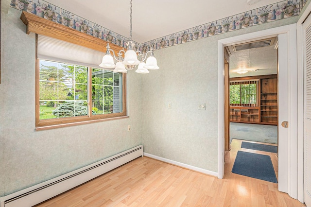 1269 Potomac Dr, Rochester Hills, MI 48306 - unfurnished room featuring a baseboard radiator, a chandelier, wood finished floors, and baseboards