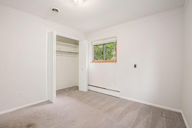1269 Potomac Dr, Rochester Hills, MI 48306 - unfurnished bedroom featuring baseboard heating, light carpet, a closet, and baseboards