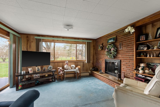 1269 Potomac Dr, Rochester Hills, MI 48306 - living area featuring carpet floors, wooden walls, a fireplace, and baseboard heating