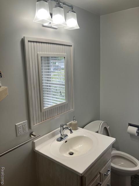 161 Fourth, Harbor Beach, MI 48441 - bathroom with vanity and toilet