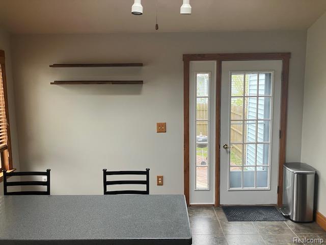 161 Fourth, Harbor Beach, MI 48441 - dining room featuring baseboards
