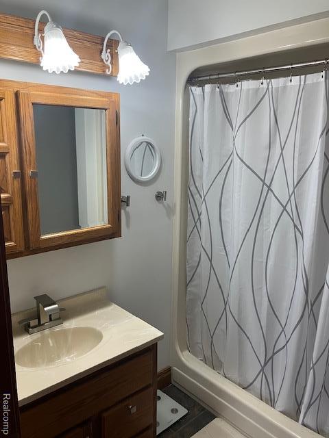 161 Fourth, Harbor Beach, MI 48441 - full bathroom featuring vanity and curtained shower