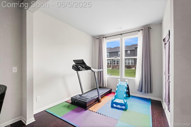 4782 Broomfield Way, Lake Orion, MI 48359 - exercise room featuring wood finished floors and baseboards