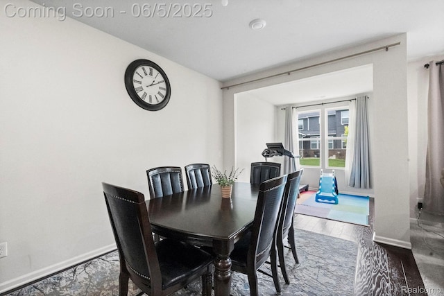 4782 Broomfield Way, Lake Orion, MI 48359 - dining area featuring baseboards and wood finished floors