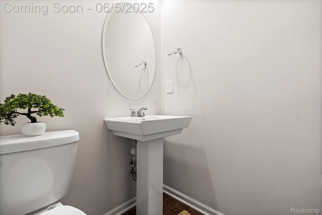 4782 Broomfield Way, Lake Orion, MI 48359 - half bathroom featuring toilet and baseboards