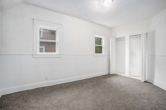 1702 Charles Ave, Kalamazoo, MI 49048 - unfurnished bedroom with carpet floors and a wainscoted wall