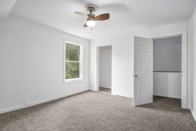 1702 Charles Ave, Kalamazoo, MI 49048 - unfurnished bedroom featuring carpet floors, a ceiling fan, and baseboards