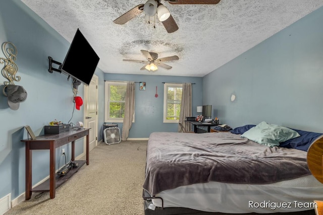 4160 Knapp Valley Dr NE, Grand Rapids, MI 49525 - carpeted bedroom with baseboards, a textured ceiling, and ceiling fan
