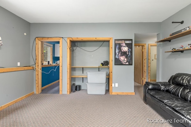 4160 Knapp Valley Dr NE, Grand Rapids, MI 49525 - living room featuring carpet flooring and baseboards