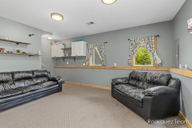 4160 Knapp Valley Dr NE, Grand Rapids, MI 49525 - carpeted living room featuring baseboards