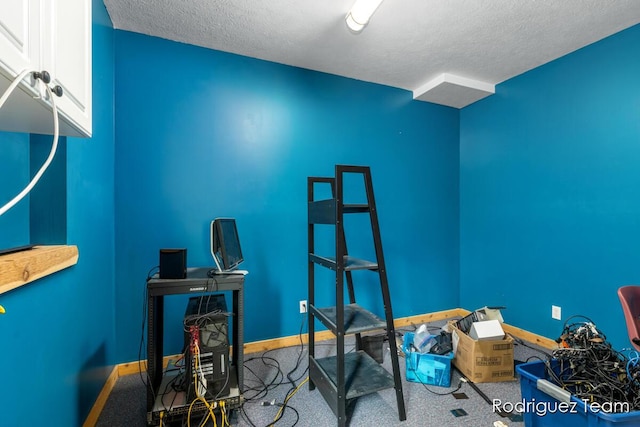 4160 Knapp Valley Dr NE, Grand Rapids, MI 49525 - office area featuring carpet flooring, a textured ceiling, and baseboards